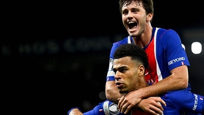 Desire Doue celebrates with Joao Neves after scoring his team's first goal vs Barcelona (AFP) Desire Doue celebrates with Joao Neves after scoring his team's first goal vs Barcelona (AFP)