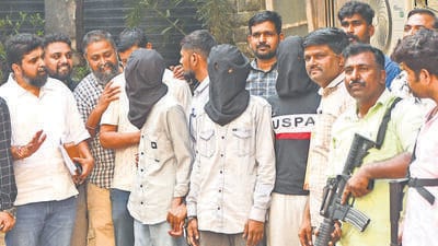 Three primary accused Actor Tiger Shroff firing case are escorted by the Mumbai Crime Branch's Anti-Extortion Cell after being produce in the Esplanade Court in Mumbai. (Bhushan Koyande/HT Photo) Three primary accused Actor Tiger Shroff firing case are escorted by the Mumbai Crime Branch's Anti-Extortion Cell after being produce in the Esplanade Court in Mumbai. (Bhushan Koyande/HT Photo)