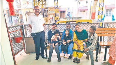 Rajesh Pandey (left) with the family of a 4-year-old girl (in black, seated on her mother’s lap) who had gone missing from CSMT. Pandey tracked her down to a children’s home in Varanasi. Rajesh Pandey (left) with the family of a 4-year-old girl (in black, seated on her mother’s lap) who had gone missing from CSMT. Pandey tracked her down to a children’s home in Varanasi.