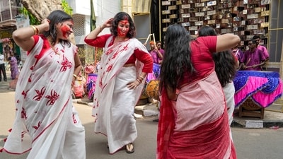 Women celebrate after 'Sindoor Khela' ritual on the occasion of 'Vijayadashami', the final day of the 'Durga Puja' festival, at a pandal, in Kolkata, West Bengal, Wednesday. (PTI) Women celebrate after 'Sindoor Khela' ritual on the occasion of 'Vijayadashami', the final day of the 'Durga Puja' festival, at a pandal, in Kolkata, West Bengal, Wednesday. (PTI)