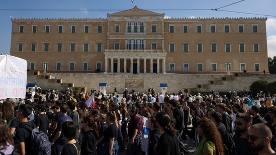 Students march in front of the Greek Parliament during a protest over rising housing costs and underfunded education, in solidarity with students in France and Spain, in Athens, Greece, October 21, 2026. REUTERS/Stelios Misinas