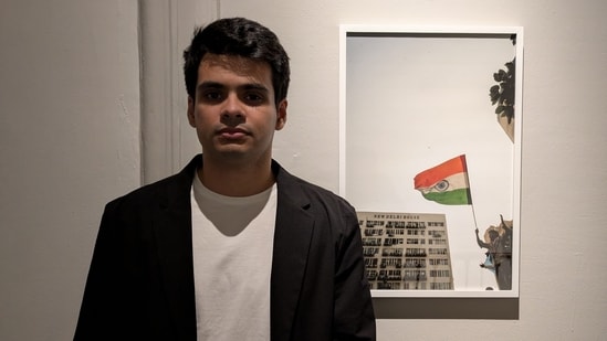 Artist and Photographer Raihan Vadra, son of Congress leader Priyanka Gandhi Vadra, with one of his photographs at Bikaner House. (PTI)
