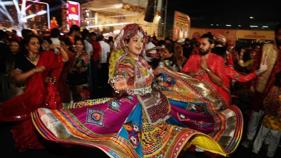 Girls perform Dandiya Raas during the Thane Raas Rang Navratri Festival’ organised at Raymond Ground in Thane. (HT File Photo/Praful Gangurde) Girls perform Dandiya Raas during the Thane Raas Rang Navratri Festival’ organised at Raymond Ground in Thane. (HT File Photo/Praful Gangurde)
