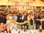 Anurag Thakur, MP Suresh Kashyap and Leader of opposition Jai Ram Thakur welcomed during the felicitation ceremony for newly elected representatives and a convention for party workers in the Theog assembly constituency, Shimla on Thursday (HT Photo)