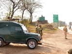 BSF and Punjab police personnel stand guard (HT File Photo/Sameer Sehgal)