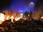 Multiple blazes gripped France as nationwide marches against soaring inflation degenerated into street violence of "extreme intensity". (Photo by Matthieu RONDEL / AFP)