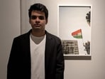 Artist and Photographer Raihan Vadra, son of Congress leader Priyanka Gandhi Vadra, with one of his photographs at Bikaner House. (PTI)