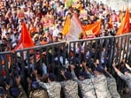 Police personnel attempt to evict National Dev Bhoomi Party workers during a protest demonstration outside the State Secretariat, in Shimla, Himachal Pradesh.