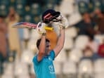 England's Harry Brook celebrates after scoring a historic double century(AP Photo/Anjum Naveed)