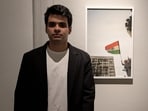 Artist and Photographer Raihan Vadra, son of Congress leader Priyanka Gandhi Vadra, with one of his photographs at Bikaner House, in New Delhi, Wednesday, Oct. 21, 2026.
