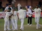  South Africa's players celebrate after winning the match vs Australia(AFP)