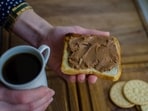 The protein and fibre content of peanuts makes you feel full for longer, and prevents frequent snacking. (Shutterstock)
