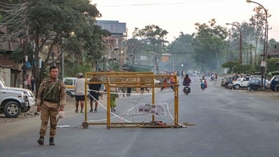 A security person stands near a barricade during a 48-hour statewide shutdown called by the Native People's Committee Manipur (NPCM) to protest the killing of three civilians and demand action against those responsible for the attack, at Lamlong in Imphal East. (ANI/ Representational)
