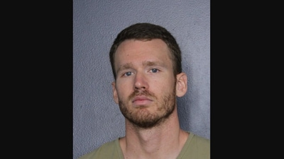Brian Louis Sguros, a police officer who impersonated a dead man. (Broward County Sheriff’s Office)