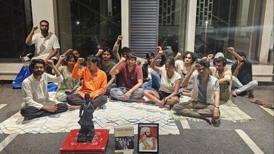 The students, who were protesting at the entrance of the campus, have shifted to a spot outside the director’s office The students, who were protesting at the entrance of the campus, have shifted to a spot outside the director’s office