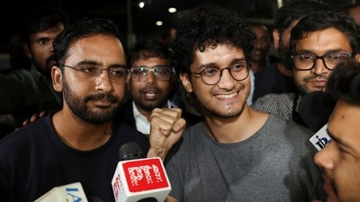 Saurav Das, chief spokesperson of the Cockroach Janta Party (CJP), and Ashutosh Ranka, CJP co-convenor, speak to the media after being released following a hearing before a Special Executive Magistrate, in New Delhi. (REUTERS)
