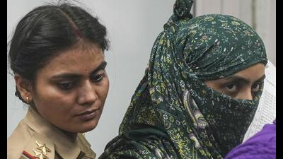 Model Shraddha Dubey, the prime suspect in cafe owner Shiva Sharma death case, undergoes medical examination at Civil Hospital, in Lucknow, on Thursday. (PTI Photo) Model Shraddha Dubey, the prime suspect in cafe owner Shiva Sharma death case, undergoes medical examination at Civil Hospital, in Lucknow, on Thursday. (PTI Photo)