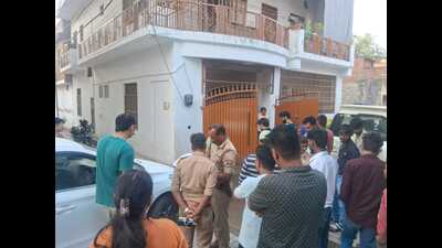 Police gathering details at the site of the accident outside the victim’s home in Naini on Thursday evening (HT) Police gathering details at the site of the accident outside the victim’s home in Naini on Thursday evening (HT)