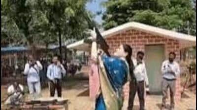 Rajnandgaon SP Ankita Sharma has been asked to explain her AK-47 firing during a Dussehra weapon-worship ceremony amid concerns over weapon-handling rules. (Video grab)