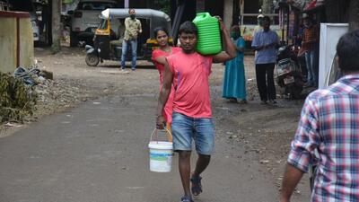 Thane, India - October 22, 2020: Residents of Diva walk for miles in search of a pail of water as the suburb like most other areas of Thane is hit by severe water cuts at Thane, Mumbai, India, on Thursday, October 22, 2020. ( Praful Gangurde/ HT Photo ) (Praful Gangurde) Thane, India - October 22, 2020: Residents of Diva walk for miles in search of a pail of water as the suburb like most other areas of Thane is hit by severe water cuts at Thane, Mumbai, India, on Thursday, October 22, 2020. ( Praful Gangurde/ HT Photo ) (Praful Gangurde)