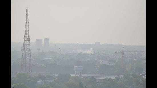 An aerial view of New Delhi Railway Station shrouded in haze amid rising pollution levels in New Delhi on Thursday. (RAJ K RAJ /HT PHOTO)
