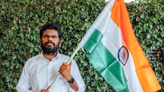 Former BJP leader and We The Leaders Foundation Chief Mentor K Annamalai holds the Indian national flag. (@annamalai_k X)