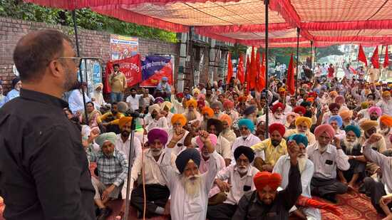 Government employees protesting outside the District Administrative Complex in Sangrur on Thursday. (HT)
