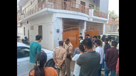 Police gathering details at the site of the accident outside the victim’s home in Naini on Thursday evening (HT)