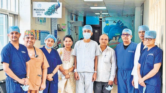 Tanmay Shinde (fifth from left), along with his parents and the doctors who performed the transplant surgery at the Bai Jerbai Wadia Hospital for Children in Parel.