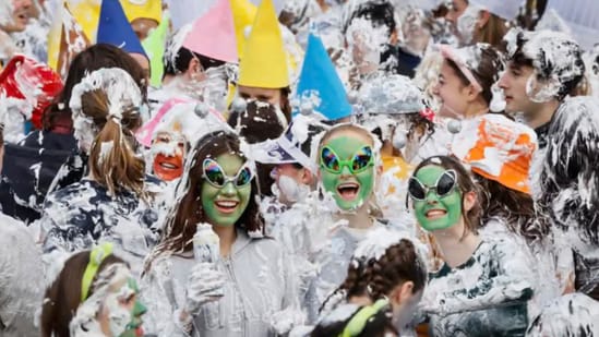 Raisin Monday sees St Andrews students covered in shaving foam.