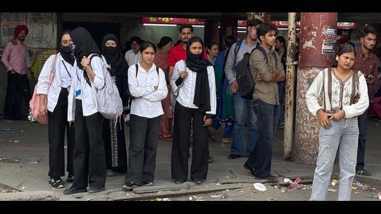 With limited bus operations, commuters experienced extended wait time at bus stand. (HT)