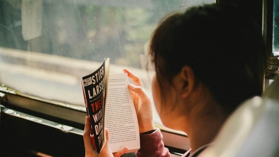 The science behind feeling dizzy and nauseous while reading a book in a moving car.