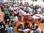 Polling officials collect election materials as they leave for their designated polling stations on the eve of elections for Uttar Pradesh Legislative Council (MLC) Graduate and Teacher constituencies, in Prayagraj on Thursday.
