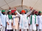 Bharatiya Kisan Union leader Rakesh Tikait at the farmers’ mahapanchayat organised by the union at Ganna Sansthan, in Dalibagh, Lucknow, on Friday. (HT Photo)