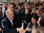 Canadian Prime Minister Mark Carney greets students during a visit to the University of Calgary, on October 15. (REUTERS)