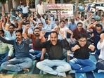 Haryana power department employees protesting against privatisation in Panchkula on Thursday. (Sant Arora/HT)