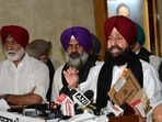 Leader of opposition Partap Singh Bajwa along with other Congress MLAs after walking out of the Punjab assembly on the second day of the session in Chandigarh on Friday. (Ravi Kumar/HT)