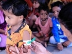 Nutrition check of kids at an anganwadi centre in Prayagraj. (File photo)