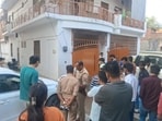 Police gathering details at the site of the accident outside the victim’s home in Naini on Thursday evening (HT)