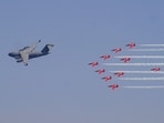 Sarang Helicopter Display Team performs manoeuvres during the opening day of the three-day Indian Air Force (IAF) aerial display 'Wings Over Ganges' over the Malviya Bridge on the Ganga river, in Varanasi (PTI)