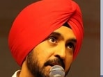 Punjabi singer Diljit Dosanjh and Bollywood superstar Amitabh Bachchan.