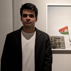 Artist and Photographer Raihan Vadra, son of Congress leader Priyanka Gandhi Vadra, with one of his photographs at Bikaner House. 