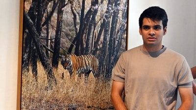 Rehan R Vadra with his photo Exhibition inside the gallery space at Bikaner House, after photographs documenting youth protests, exhibited by the nephew of Indian opposition leader Rahul Gandhi and son of Indian National Congress (INC) leader Priyanka Gandhi Vadra, were removed from display, in New Delhi, India, October 22, 2026. (Sonu Mehta/Hindustan Times)