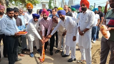 Mayor Sarabjit Singh Samana inaugurating the paver block work in Mauli Baidwan on Friday.