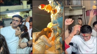 পাড়ার পুজোর ভাসানে মেয়ে সানাকে নিয়ে সৌরভ। পাড়ার পুজোর ভাসানে মেয়ে সানাকে নিয়ে সৌরভ।