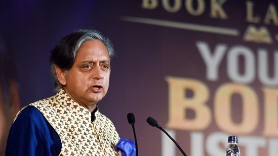 Tharoor argued that photographs documenting a protest should not automatically be treated as political statements.