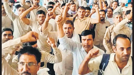 Haryana Roadways employees during the protest in Hisar on Friday. (HT Photo)
