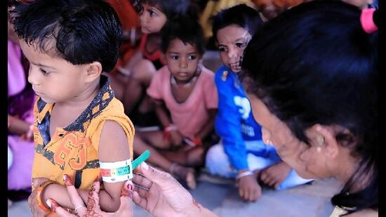 Nutrition check of kids at an anganwadi centre in Prayagraj. (File photo)