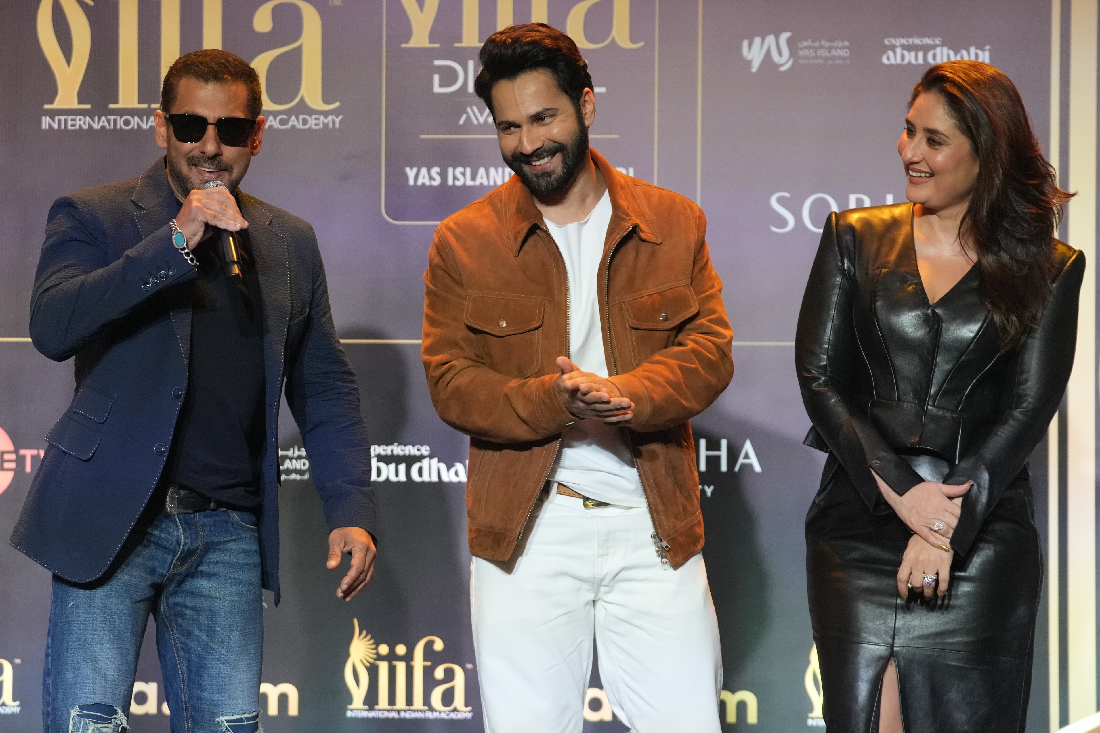 Bollywood actor Salman Khan, left, speaks as actors Varun Dhawan, center, and Kareena Kapoor Khan listen during a press conference to announce the dates and venue for the 2027 International Indian Film Academy (IIFA) Awards in Mumbai, India, Thursday, Oct. 22, 2026.(AP Photo/Rafiq Maqbool) (AP Photo/Rafiq Maqbool)