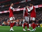 Arsenal capitalise on Man City defeat to close in on Premier League summit.